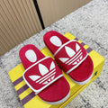 GUCCI 26S PLATFORM SLIDE SANDALS IN RED FABRIC
