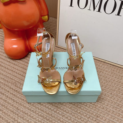 AQUAZZURA 26S BUTTERFLY HEELED SANDALS 100 MM IN GOLD CALFSKIN