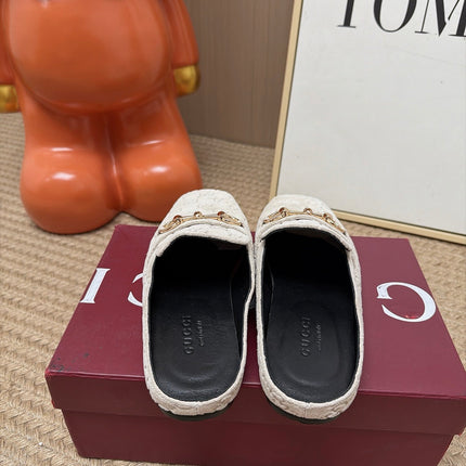 GUCCI 26S FLAT MULES IN OFF WHITE GG EMBOSSED SUEDE