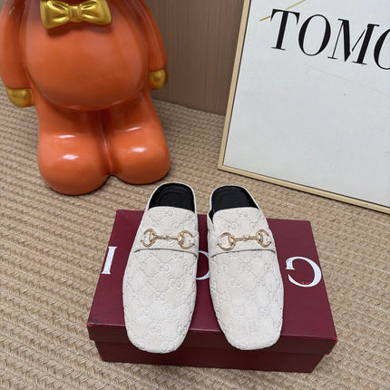GUCCI 26S FLAT MULES IN OFF WHITE GG EMBOSSED SUEDE