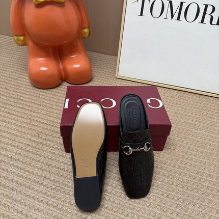 GUCCI 26S FLAT MULES IN BLACK GG EMBOSSED LAMBSKIN