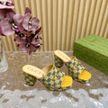 HORSEBIT SLIDE SANDAL IN TUSCANY YELLOW MONOGRAM CANVAS AND SHEEPSKIN LINING