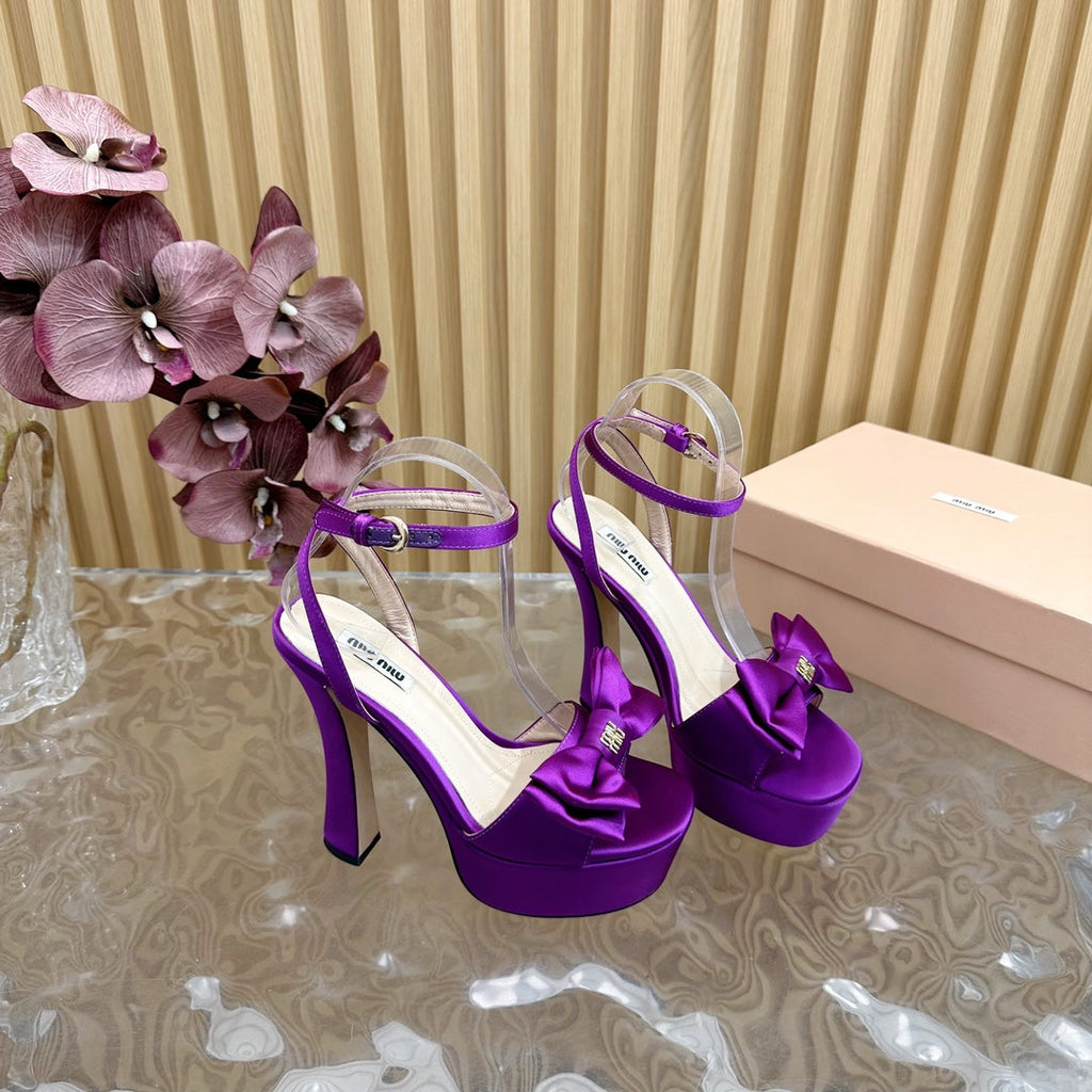HIGH BOW PLATFORM IN VIOLET SILK
