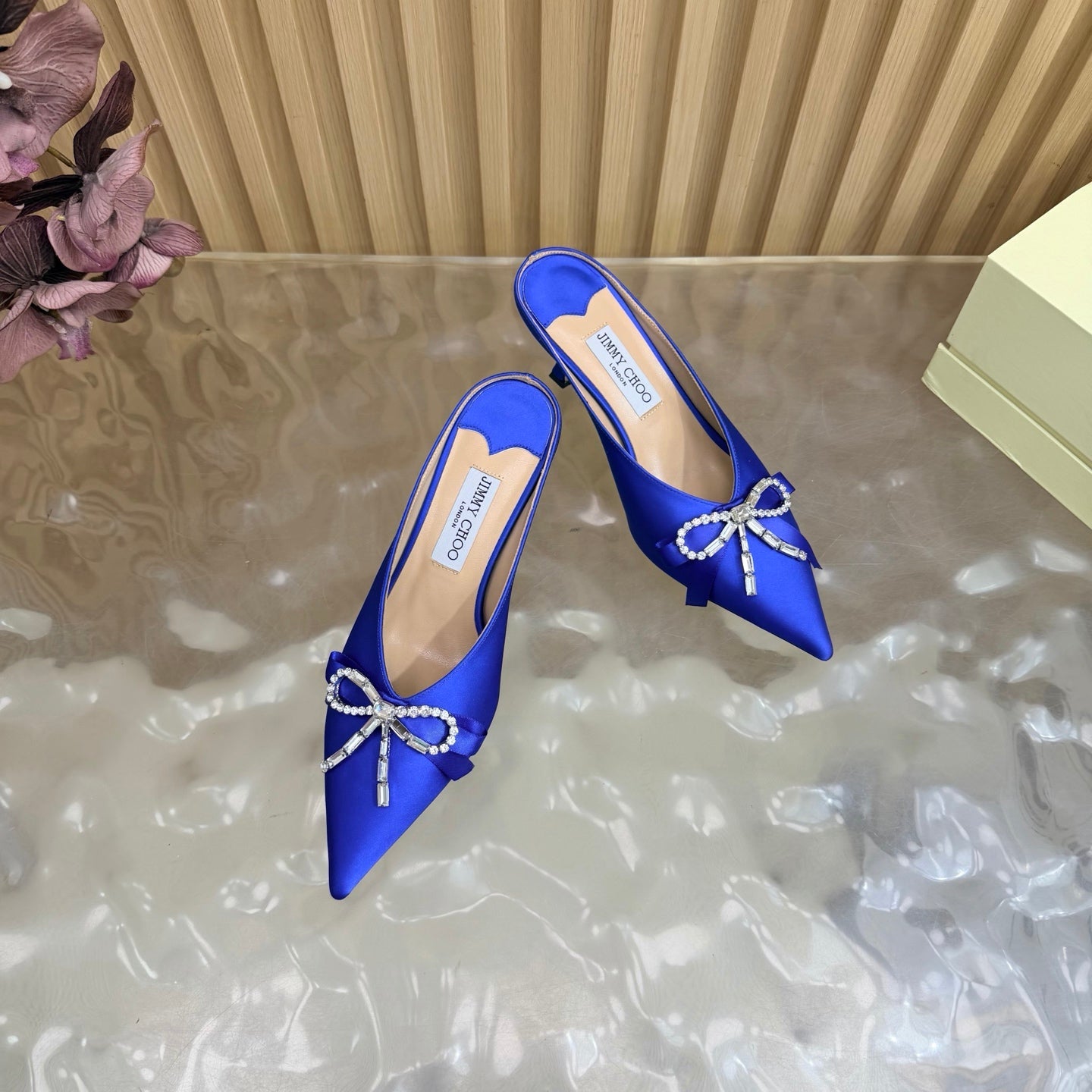 JIMMY CHOO 26S HIGH-HEELED MULES 65 MM IN NAVY BLUE SATIN WITH RHINESTONE BOW