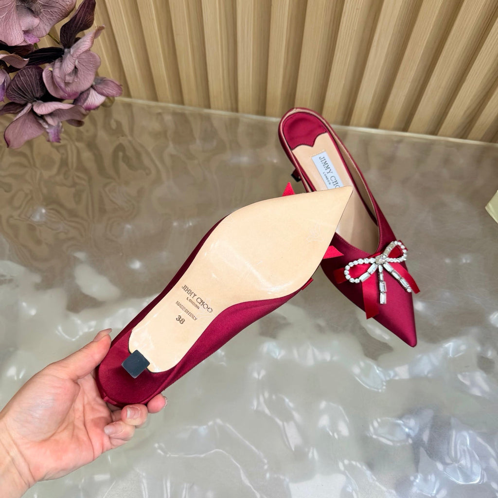 JIMMY CHOO 26S HIGH-HEELED MULES 65 MM IN RED SATIN WITH RHINESTONE BOW