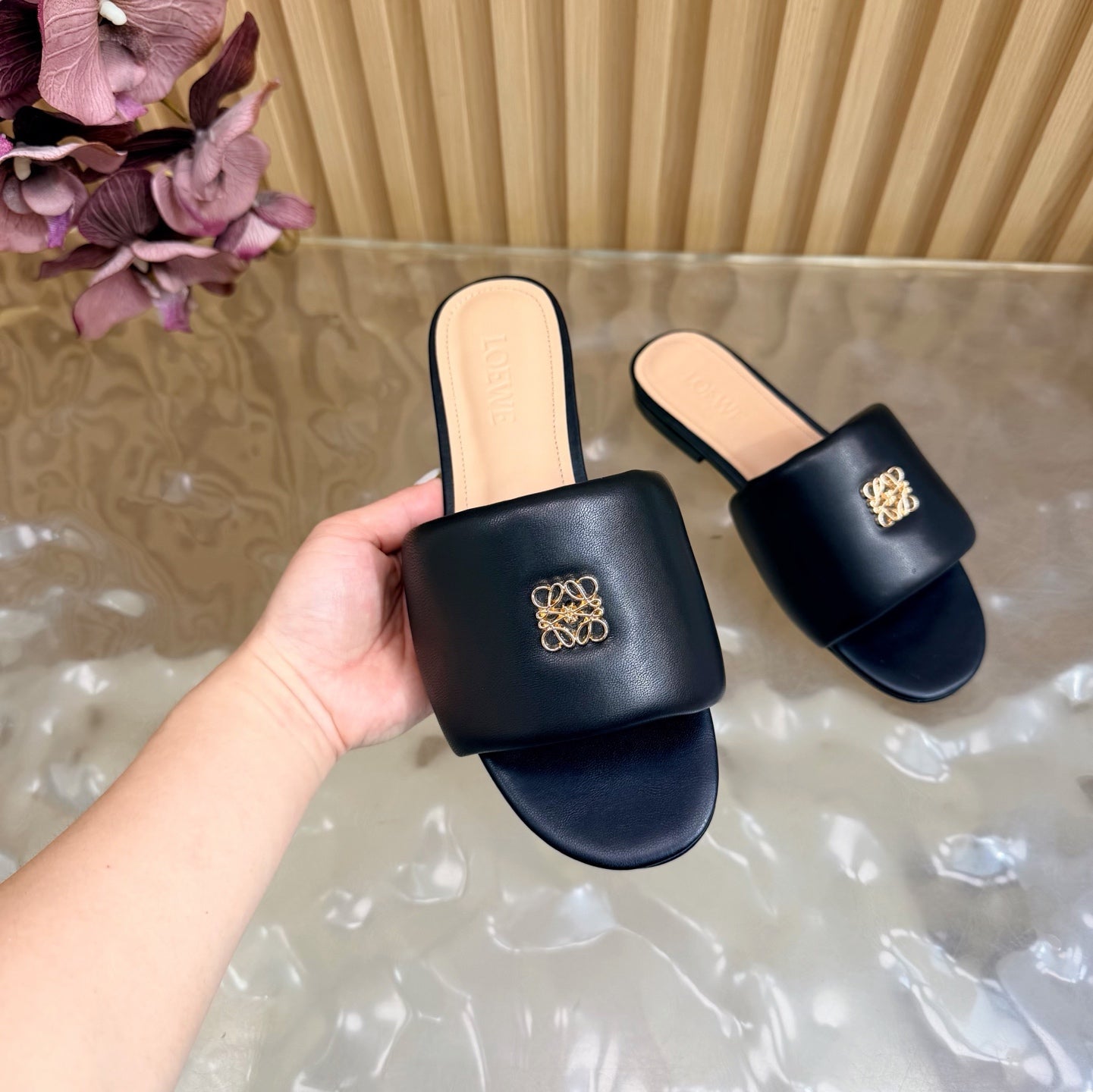 LOEWE 26S SLIDE SANDALS IN BLACK ANAGRAM PADDED LAMBSKIN