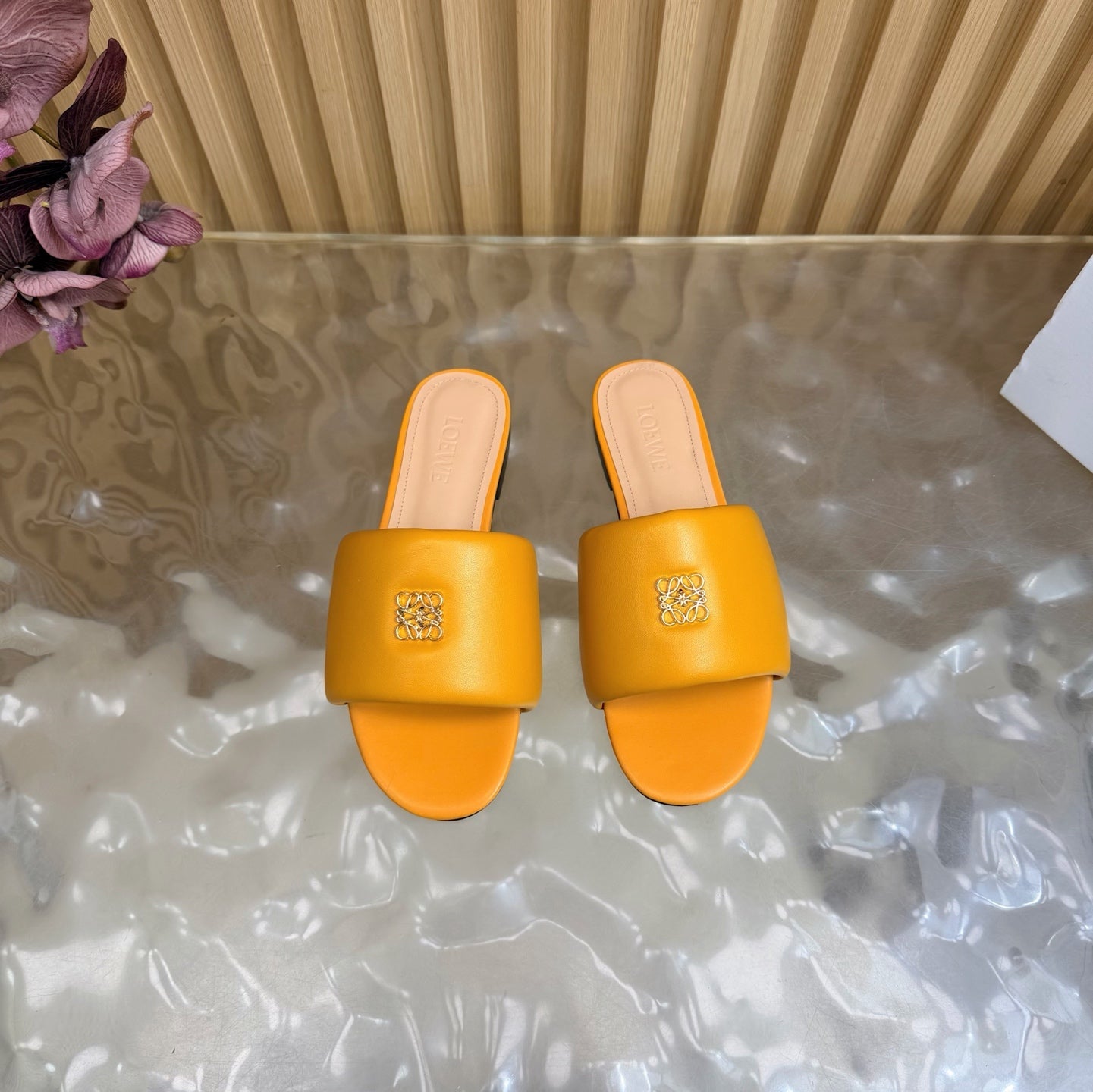 LOEWE 26S SLIDE SANDALS IN MUSTARD YELLOW ANAGRAM PADDED LAMBSKIN