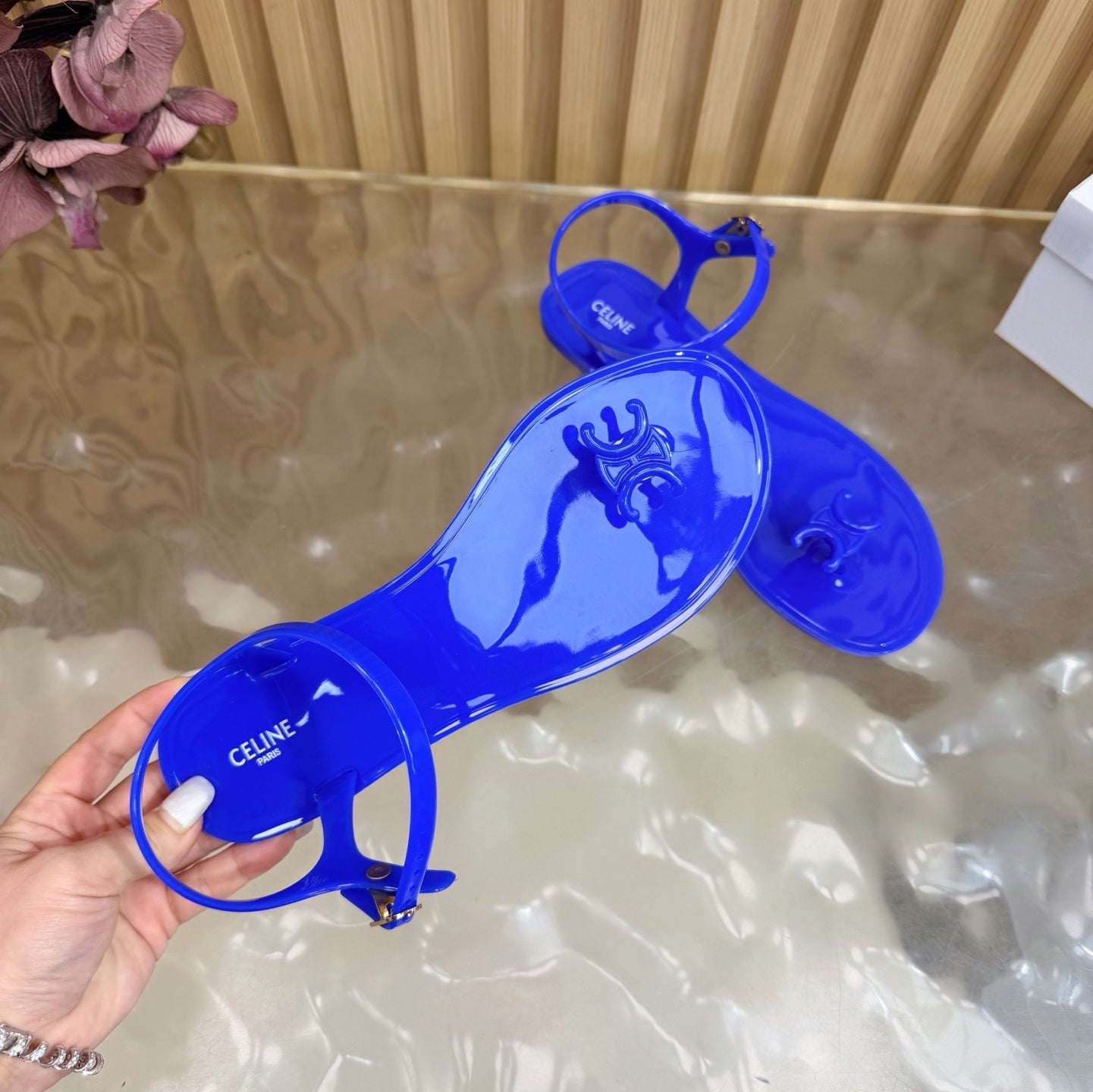 CELINE 26S TRIOMPHE JELLY THONG SANDALS IN DARK BLUE TPU GOLD HARDWARE