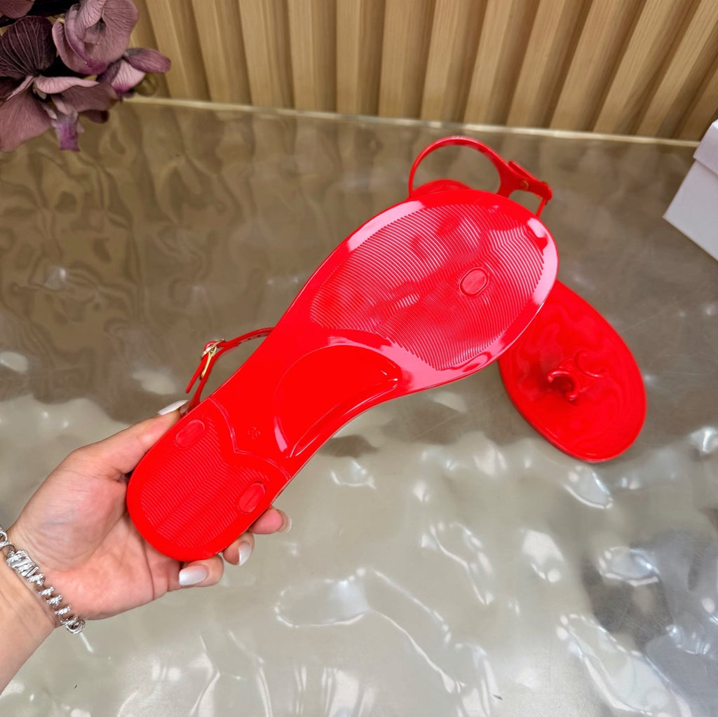 CELINE 26S TRIOMPHE JELLY THONG SANDALS IN BRIGHT RED TPU GOLD HARDWARE