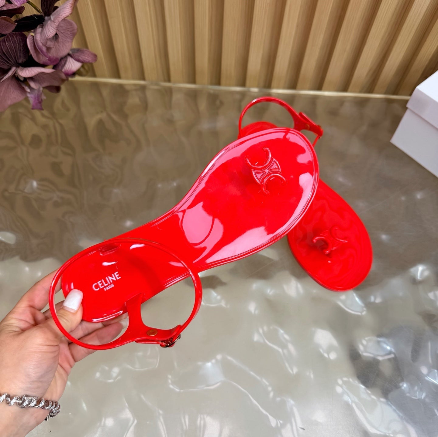CELINE 26S TRIOMPHE JELLY THONG SANDALS IN BRIGHT RED TPU GOLD HARDWARE