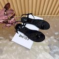 CELINE 26S TRIOMPHE JELLY THONG SANDALS IN BLACK TPU GOLD HARDWARE