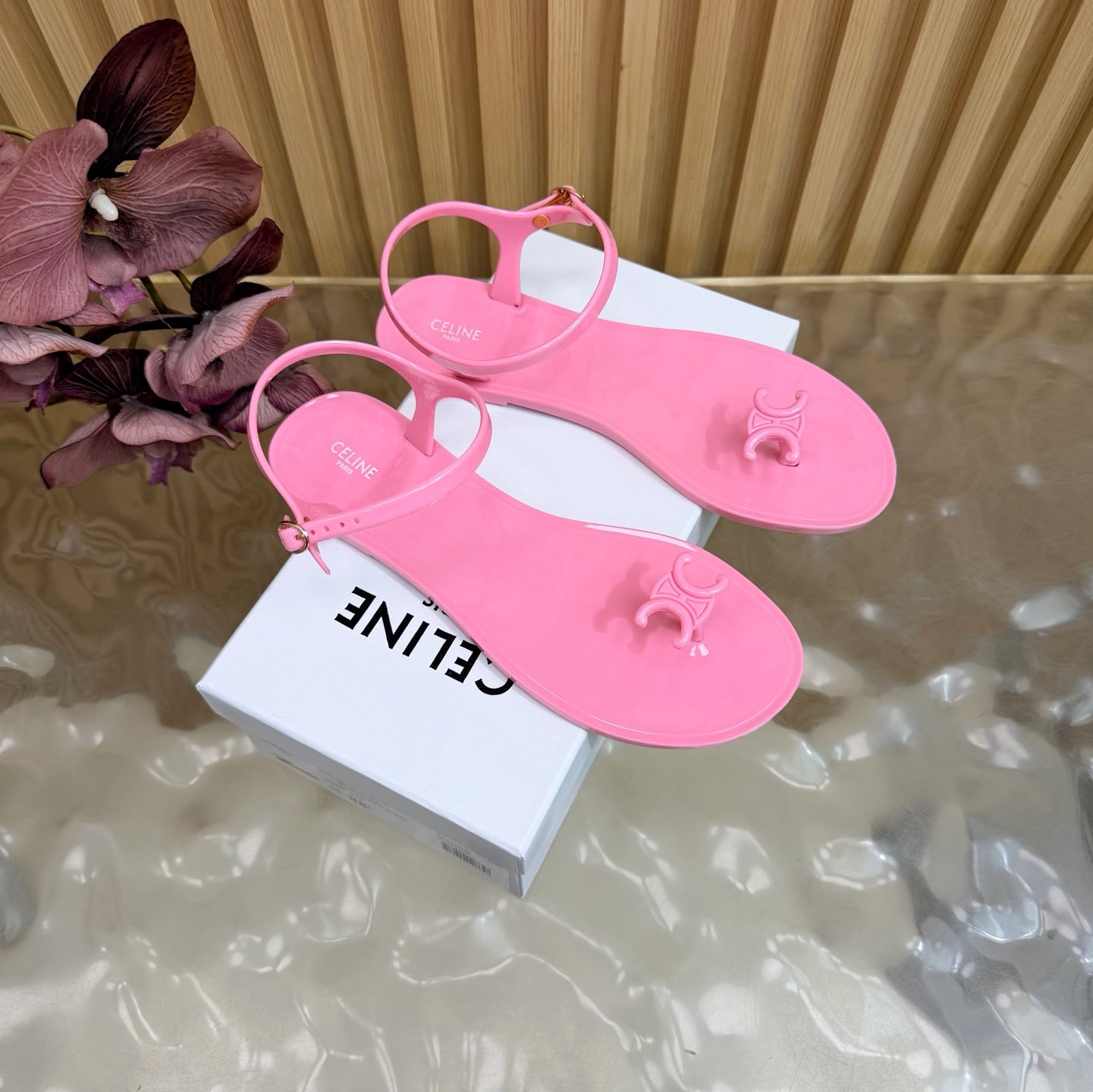 CELINE 26S TRIOMPHE JELLY THONG SANDALS IN PINK TPU GOLD HARDWARE