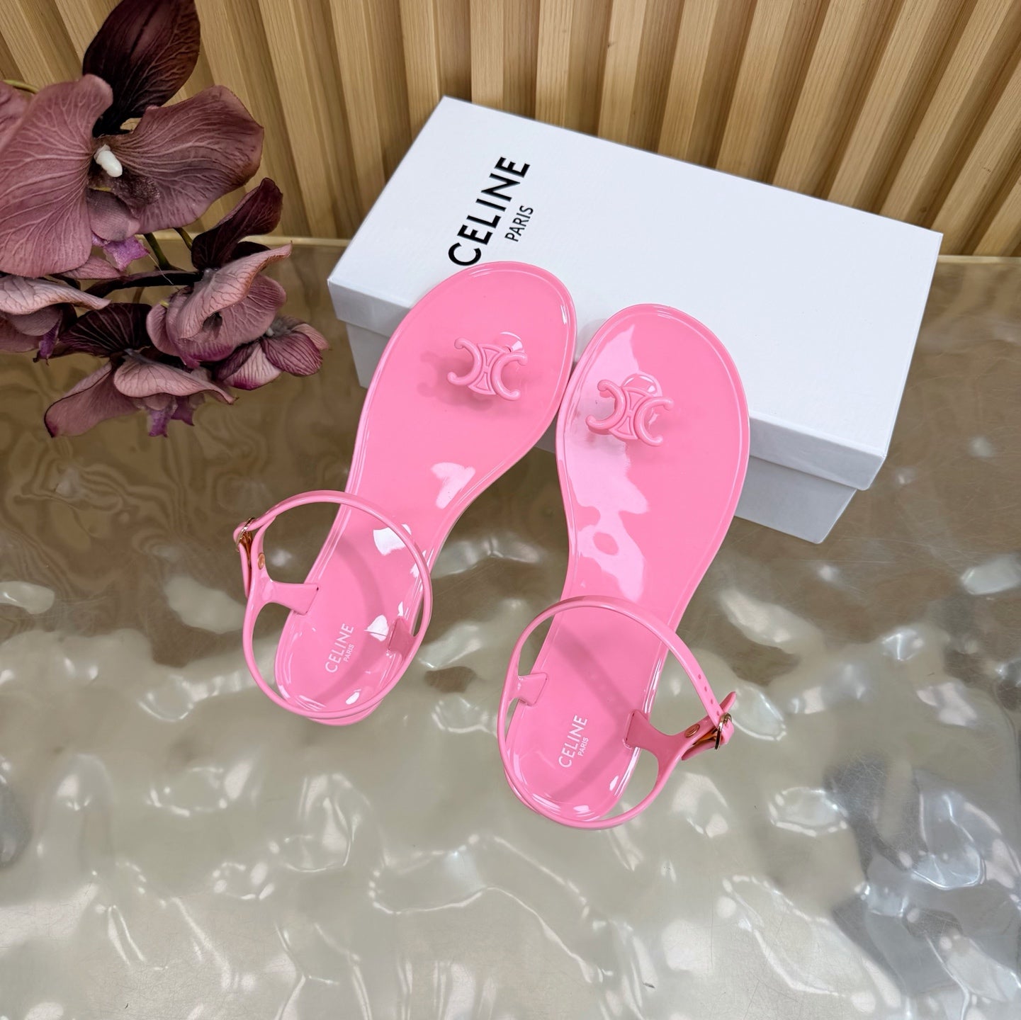 CELINE 26S TRIOMPHE JELLY THONG SANDALS IN PINK TPU GOLD HARDWARE