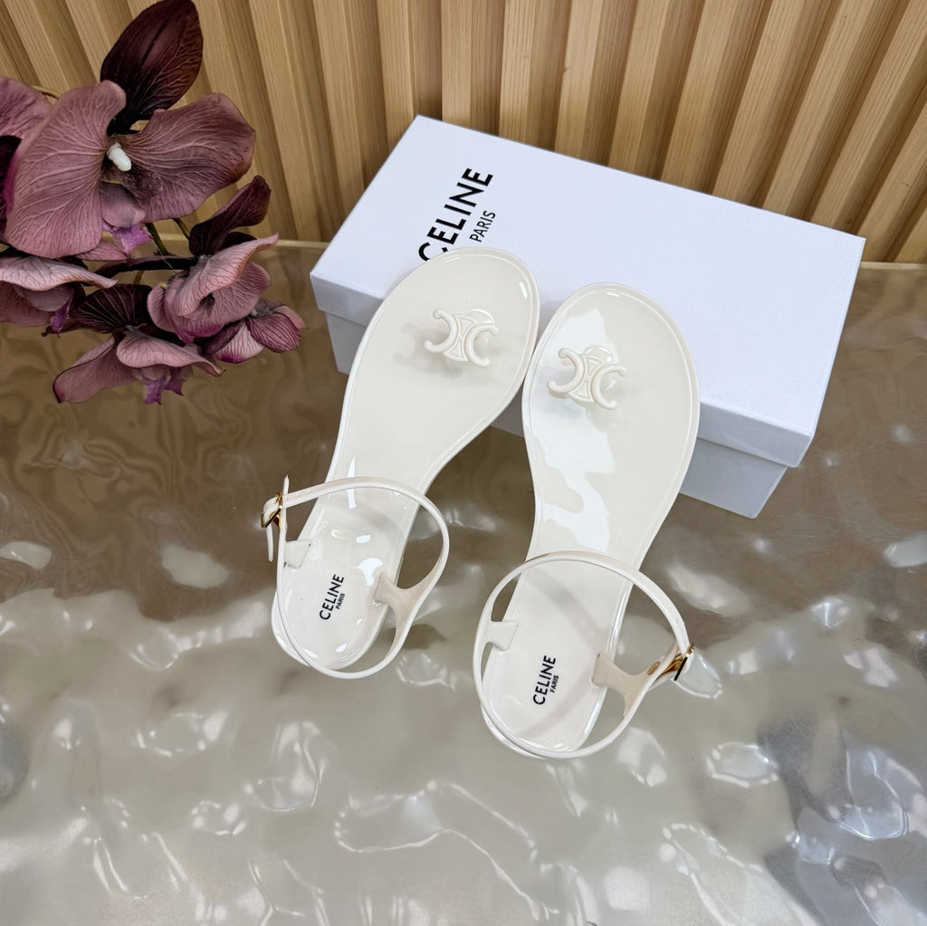 CELINE 26S TRIOMPHE JELLY THONG SANDALS IN WHITE TPU GOLD HARDWARE
