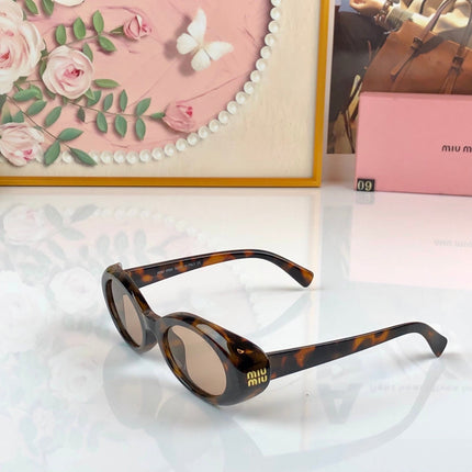 MIUMIU 26S OVAL FRAME IN ACETATE 426527
