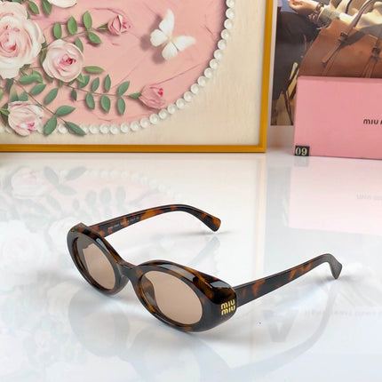 MIUMIU 26S OVAL FRAME IN ACETATE 426527