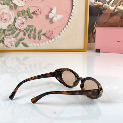 MIUMIU 26S OVAL FRAME IN ACETATE 426527