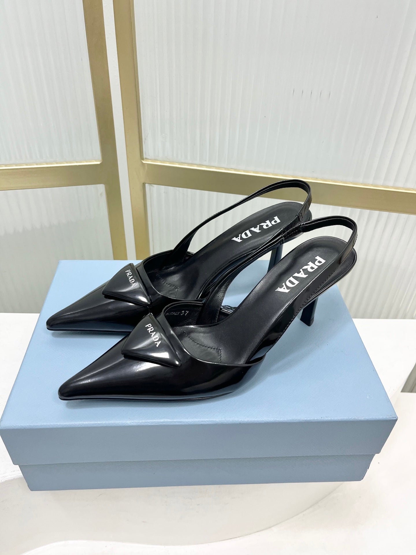 PRADA 26S SLINGBACK HIGH HEEL SANDALS 75MM IN BLACK CALFSKIN WITH LOGO
