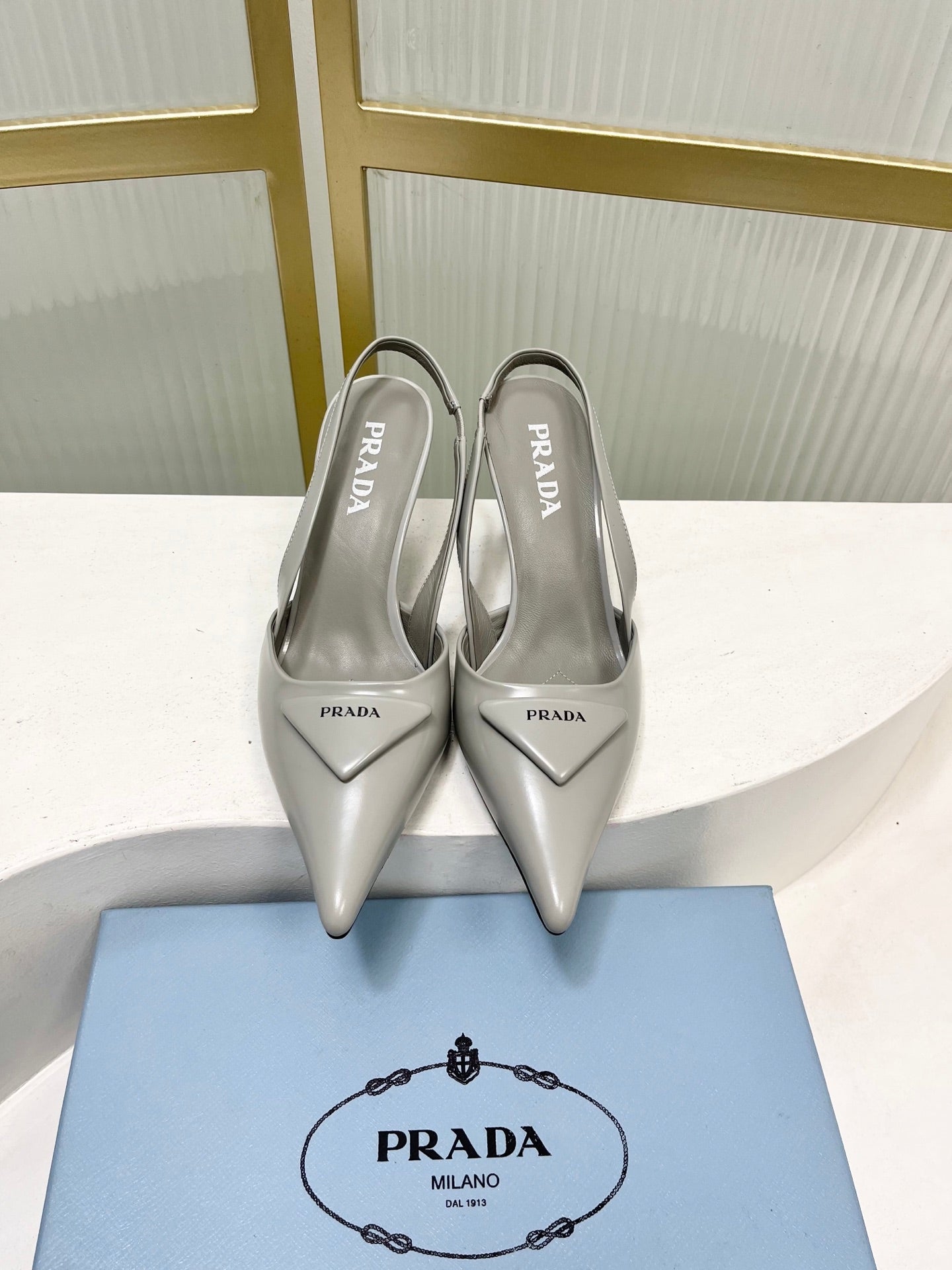 PRADA 26S SLINGBACK HIGH HEEL SANDALS 75MM IN LIGHT GRAY CALFSKIN WITH LOGO