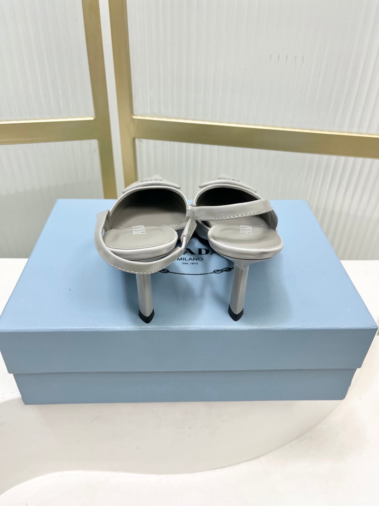PRADA 26S SLINGBACK HIGH HEEL SANDALS 75MM IN LIGHT GRAY CALFSKIN WITH LOGO