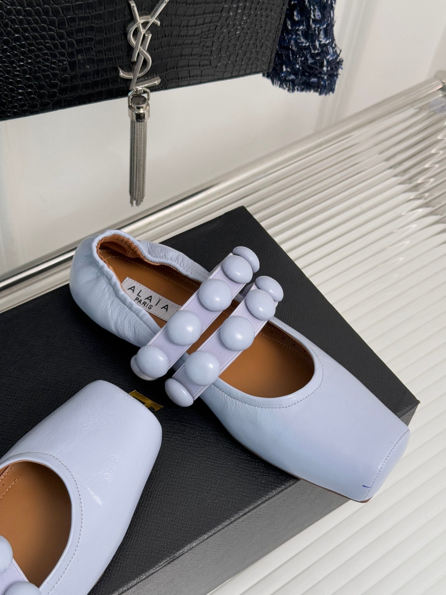 ALAIA MARY JANE PEARL IN PALE PURPLE GLOSSY LAMBSKIN