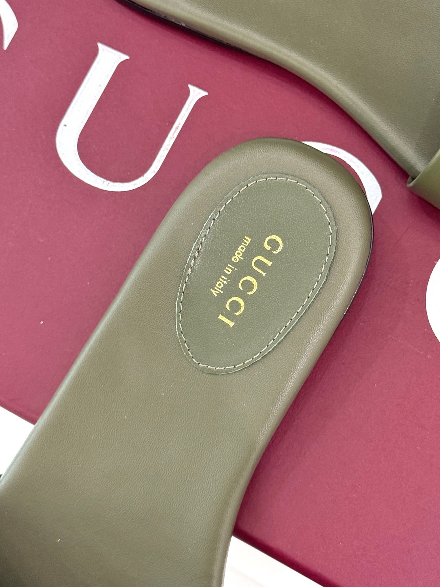 SLIDE SANDALS IN MOSS GREEN CALFSKIN WITH GOLD HARDWARE