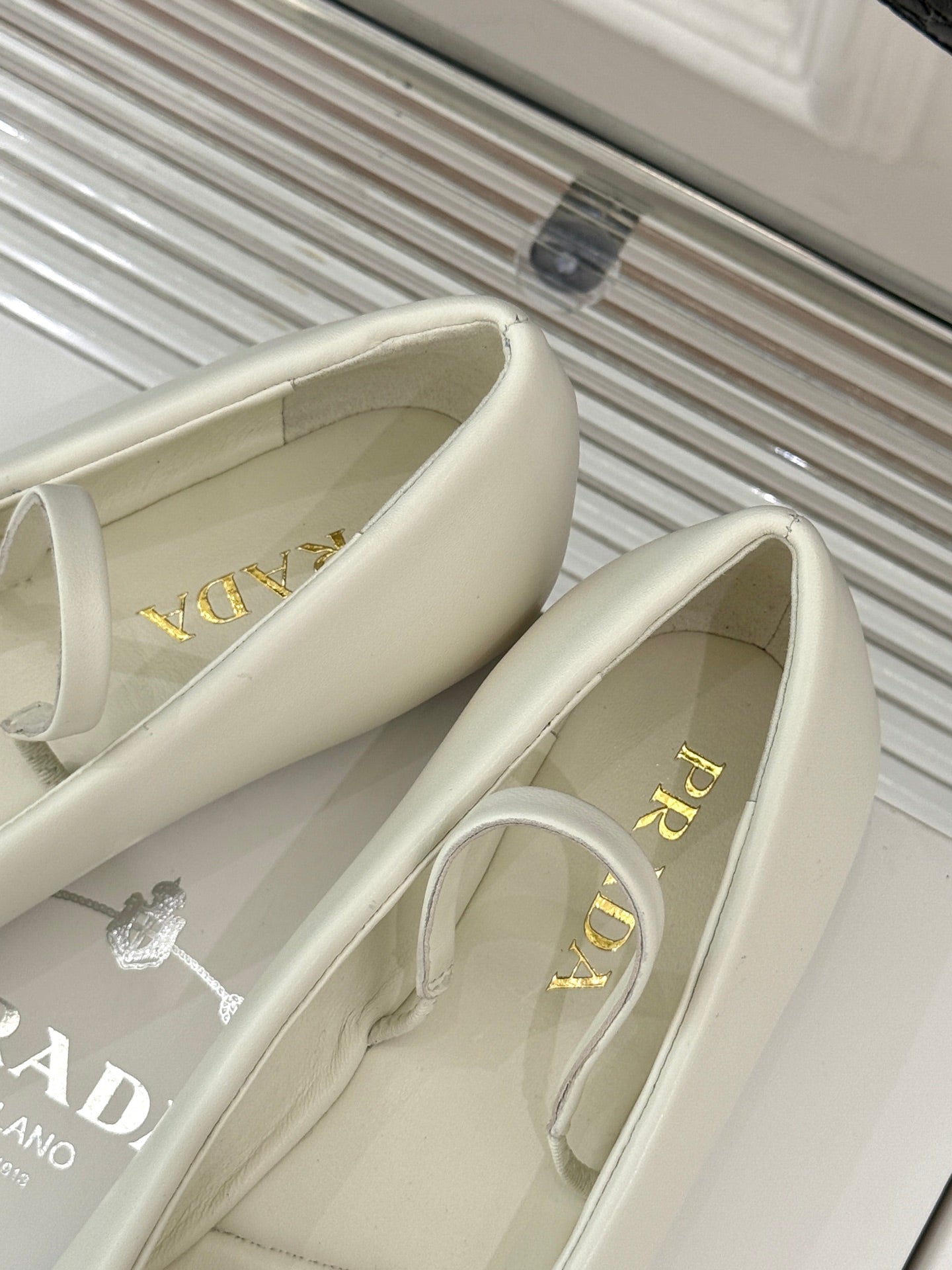 PRADA 25S SOFT PADDED BALLERINAS IN IVORY NAPPA LEATHER