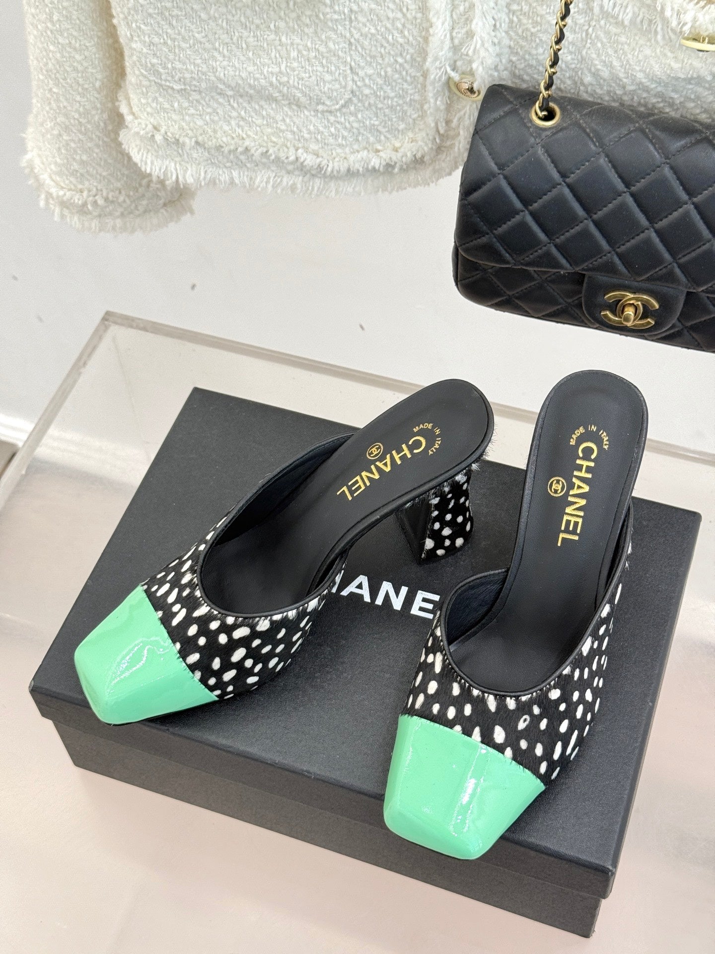 CHANEL POLKA DOT PATTERN MULES IN BLACK MIX GREEN FUR