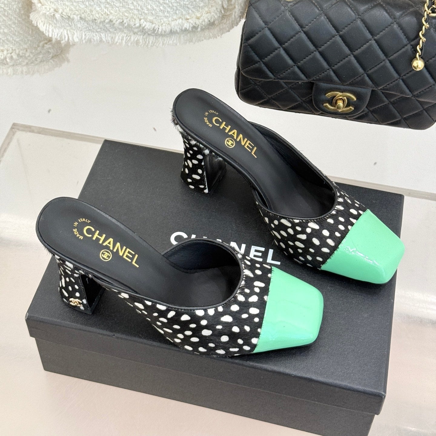 CHANEL POLKA DOT PATTERN MULES IN BLACK MIX GREEN FUR