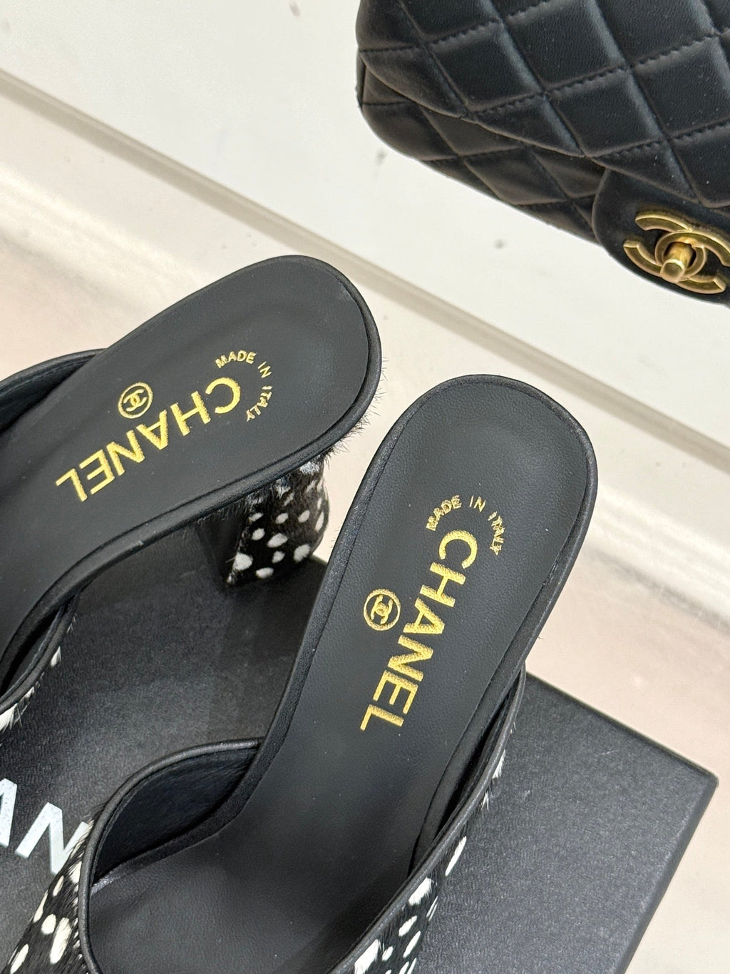 CHANEL POLKA DOT PATTERN MULES IN BLACK MIX GREEN FUR