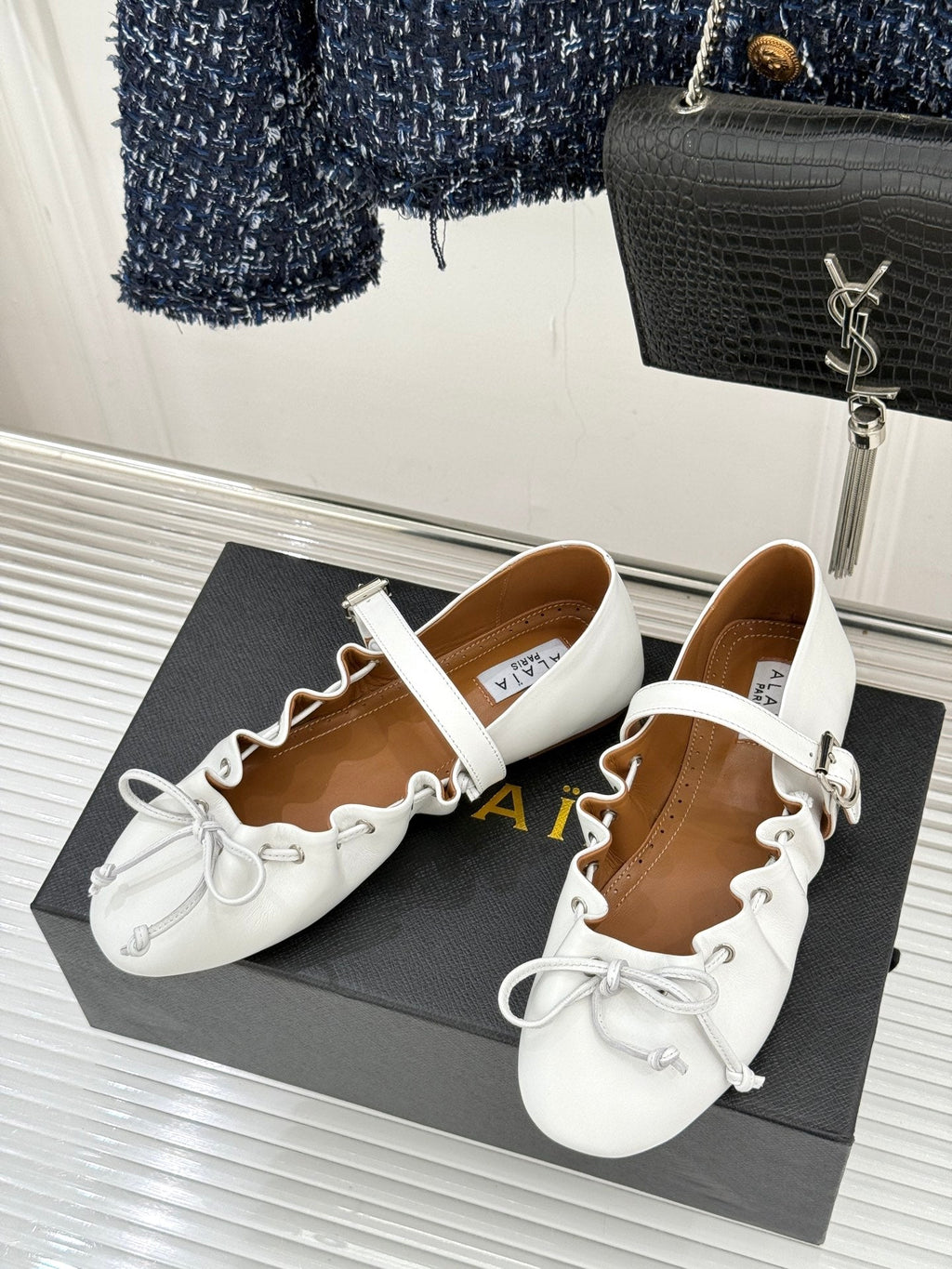 ALAIA 26S MARY JANE FLATS IN WHITE LAMBSKIN WITH BOW