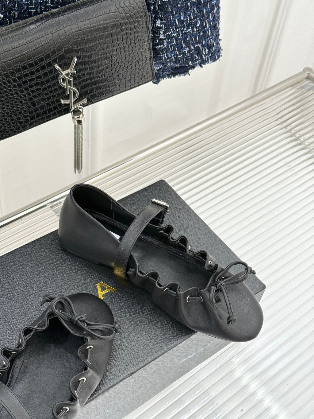 ALAIA 26S MARY JANE FLATS IN BLACK LAMBSKIN WITH BOW