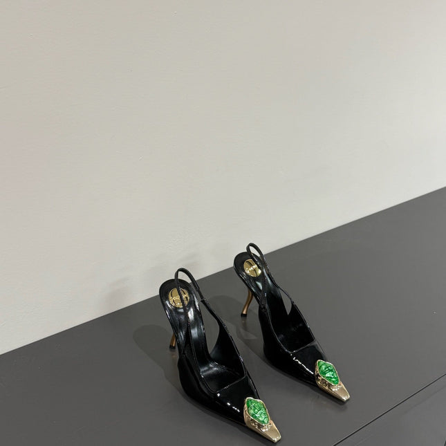 GREEN GEM-STUDDED SLINGBACK PUMPS IN BLACK PATENT CALFSKIN