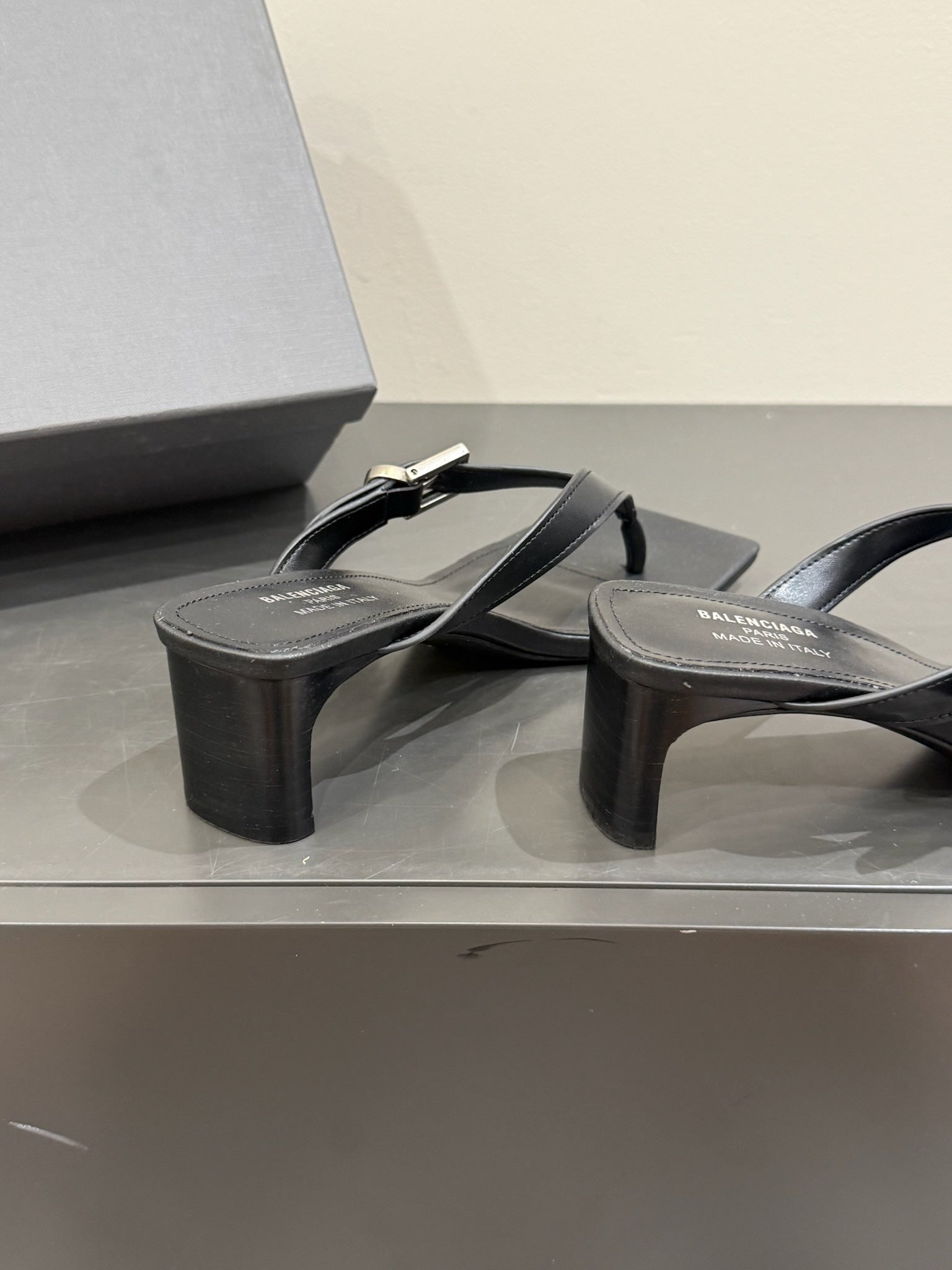 BALENCIAGA 25S HIGH-HEELED FLIP-FLOPS IN BLACK CALFSKIN WITH SILVER HARDWARE