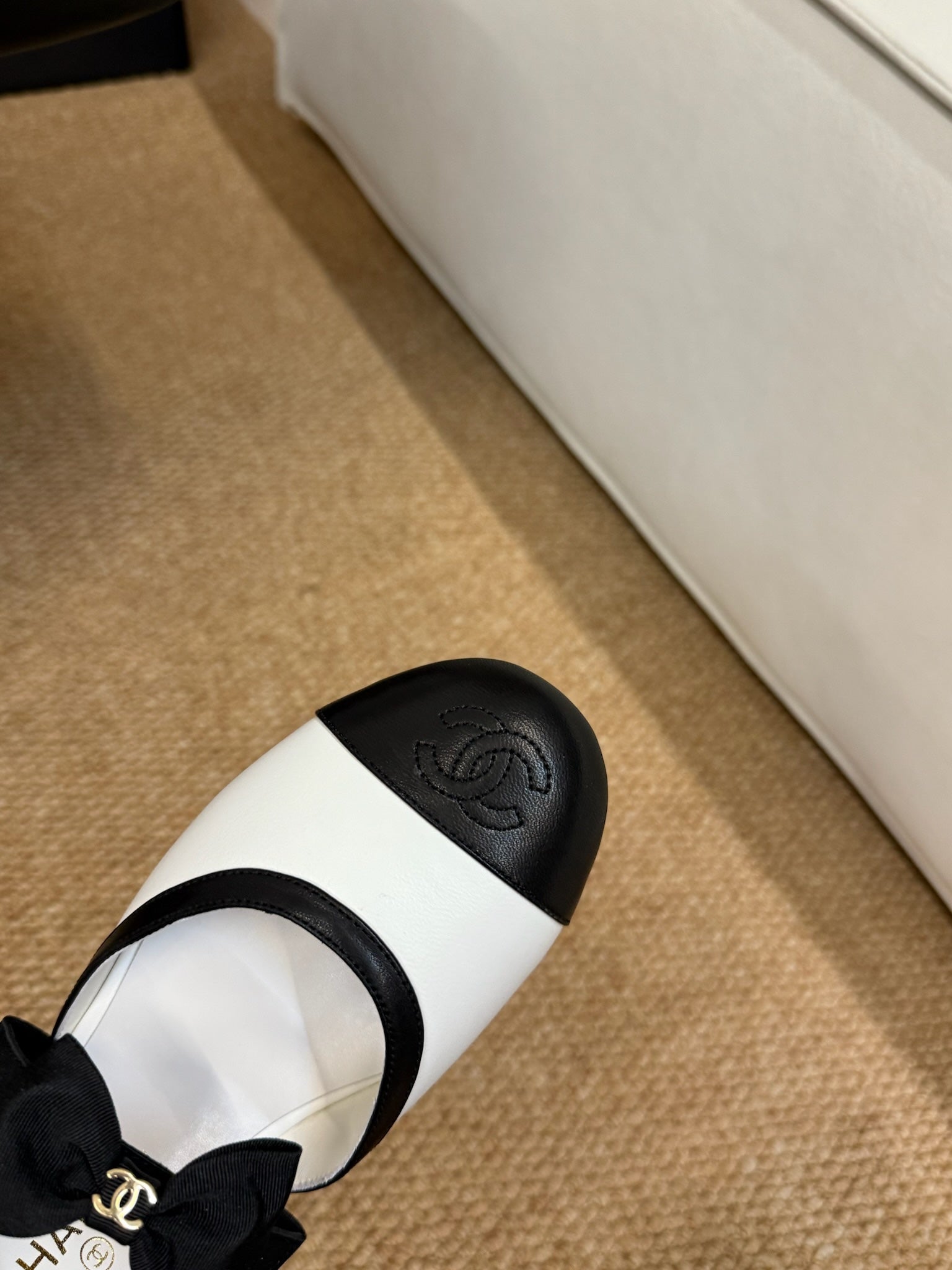 CHANEL 26S MARY JANE SLINGBACK FLATS IN WHITE AND BLACK CALFSKIN CAP TOE RIBBON STRAP