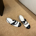 CHANEL 26S MARY JANE SLINGBACK FLATS IN WHITE AND BLACK CALFSKIN CAP TOE RIBBON STRAP
