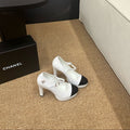 CHANEL 26S MARY JANE HEELS IN WHITE CALFSKIN WITH BLACK CAP TOE