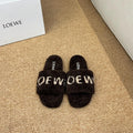 LOEWE 26S FLUFFY SLIDE SANDALS IN DARK BROWN SHEARLING LOGO