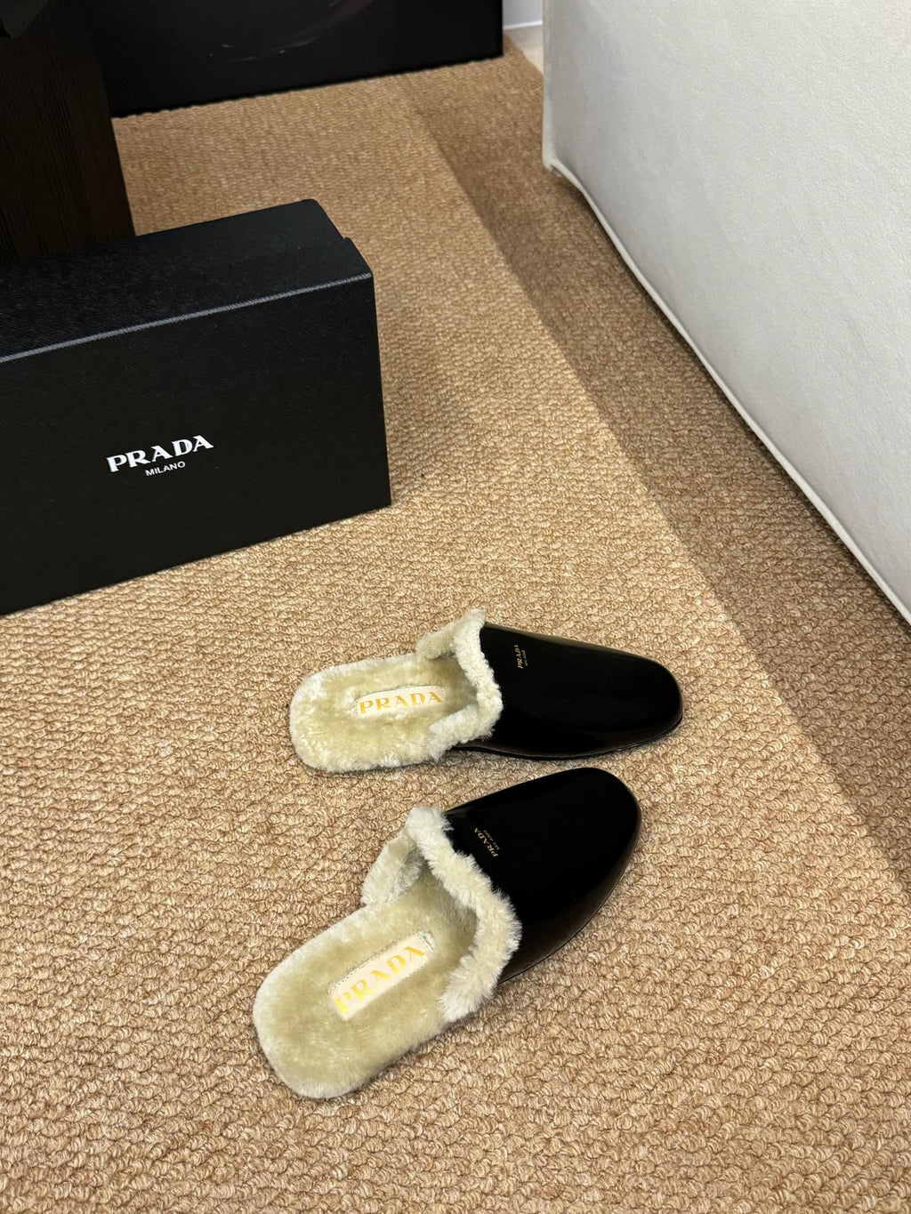 PRADA 26S SHEARLING MULE SLIPPERS IN BLACK CALFSKIN