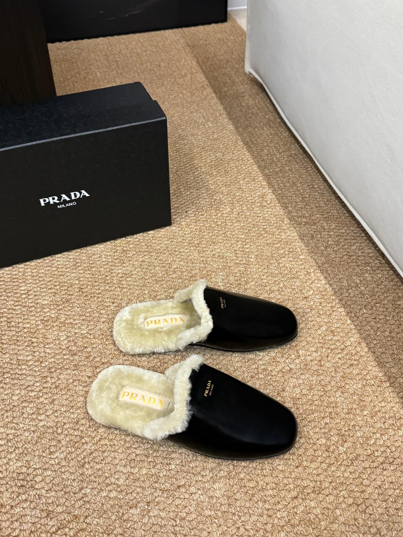 PRADA 26S SHEARLING MULE SLIPPERS IN BLACK CALFSKIN