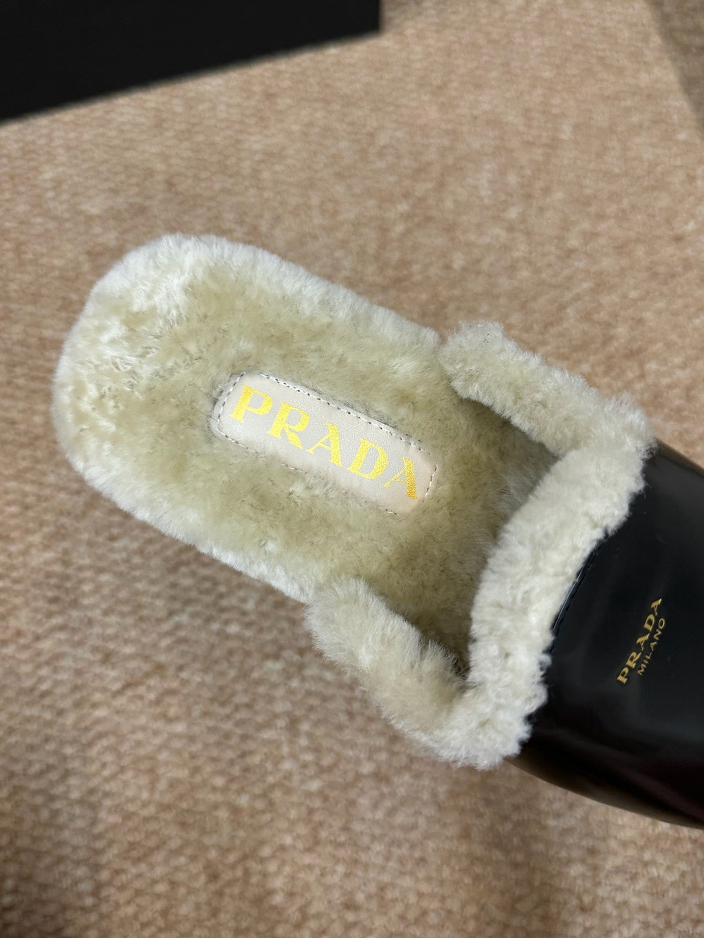 PRADA 26S SHEARLING MULE SLIPPERS IN BLACK CALFSKIN