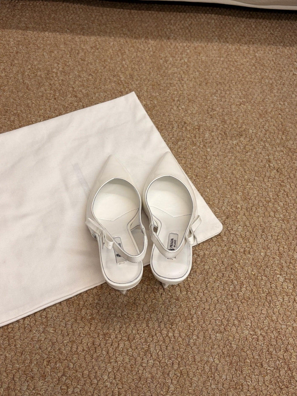 PRADA 26S SLINGBACK PUMPS IN WHITE PATENT CALFSKIN