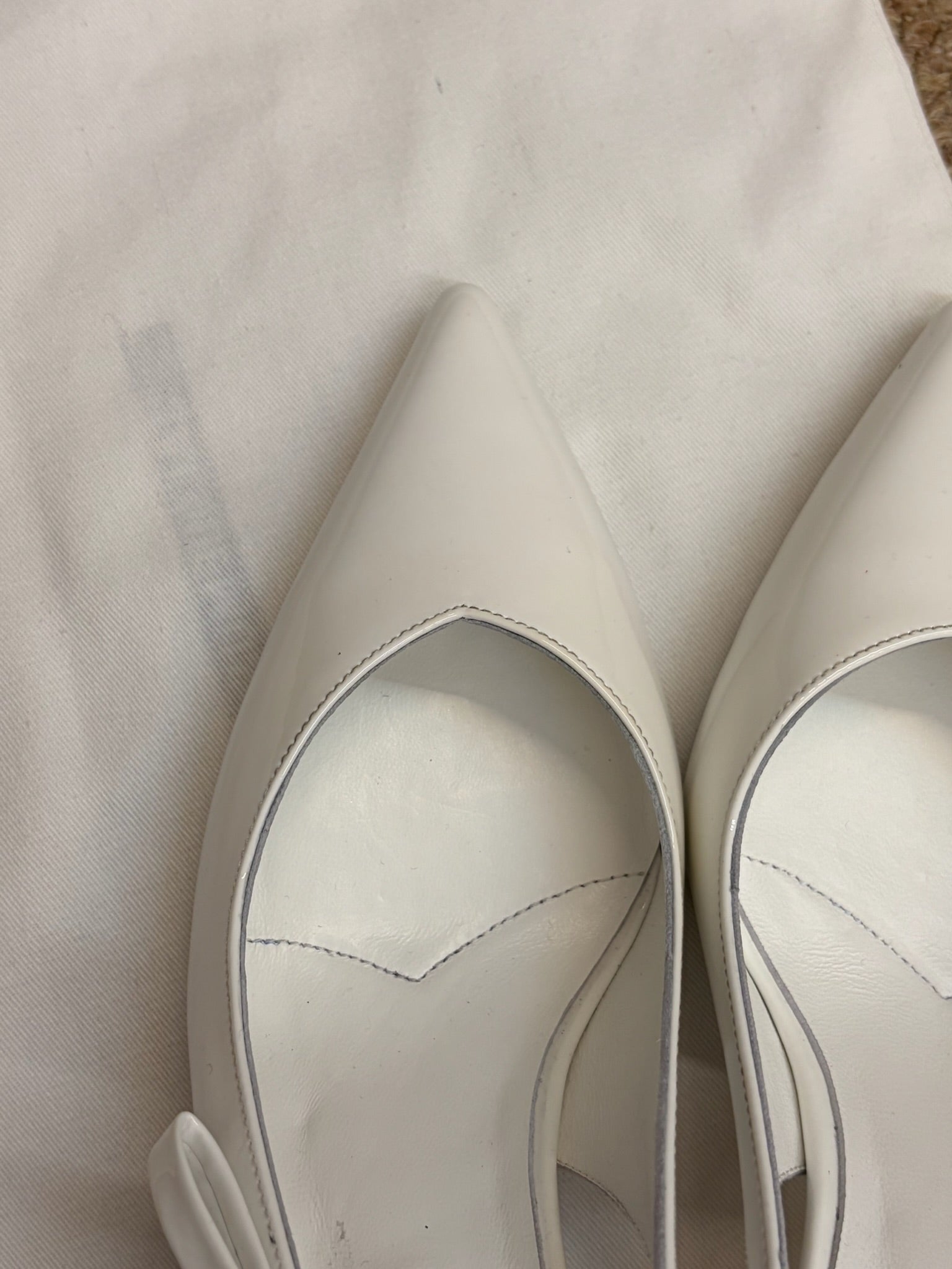 PRADA 26S SLINGBACK PUMPS IN WHITE PATENT CALFSKIN
