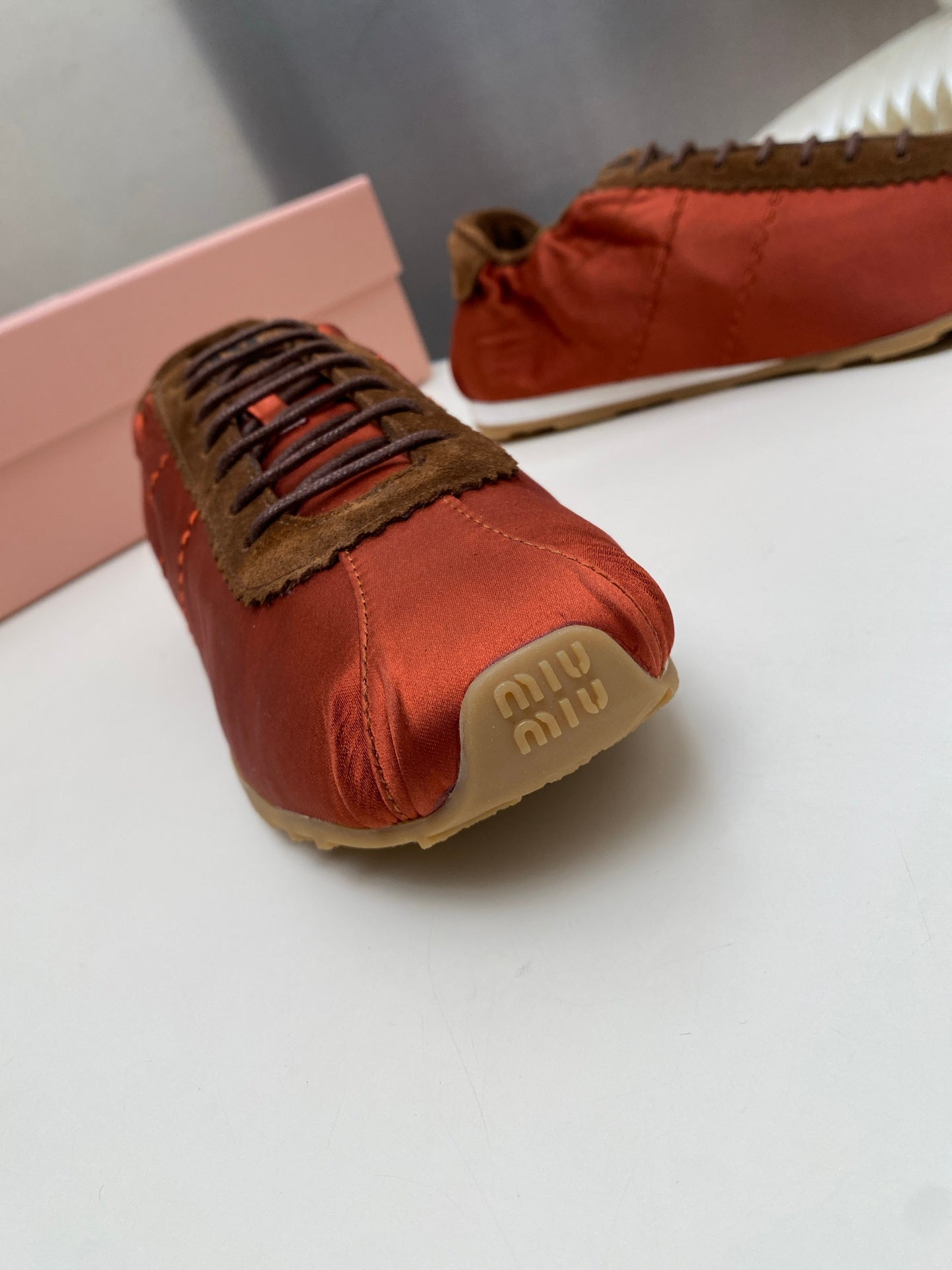 MIUMIU 26S SNEAKERS IN RUST RED PLUME SATIN