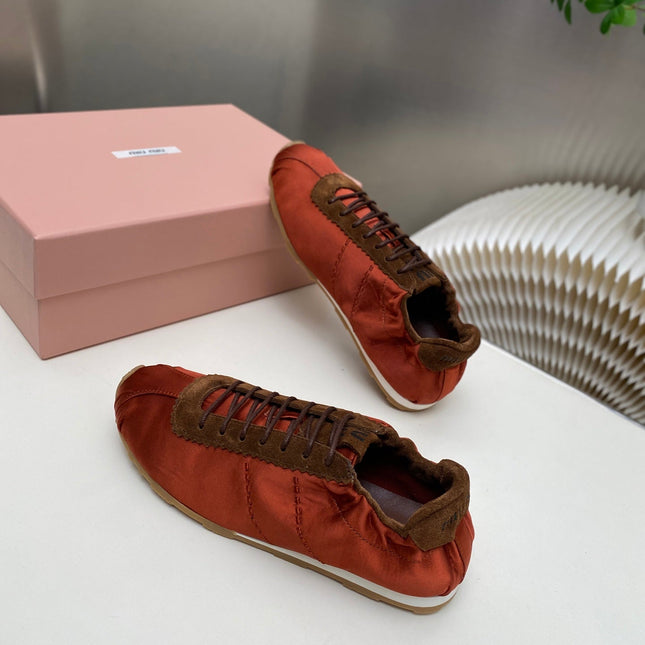 MIUMIU 26S SNEAKERS IN RUST RED PLUME SATIN