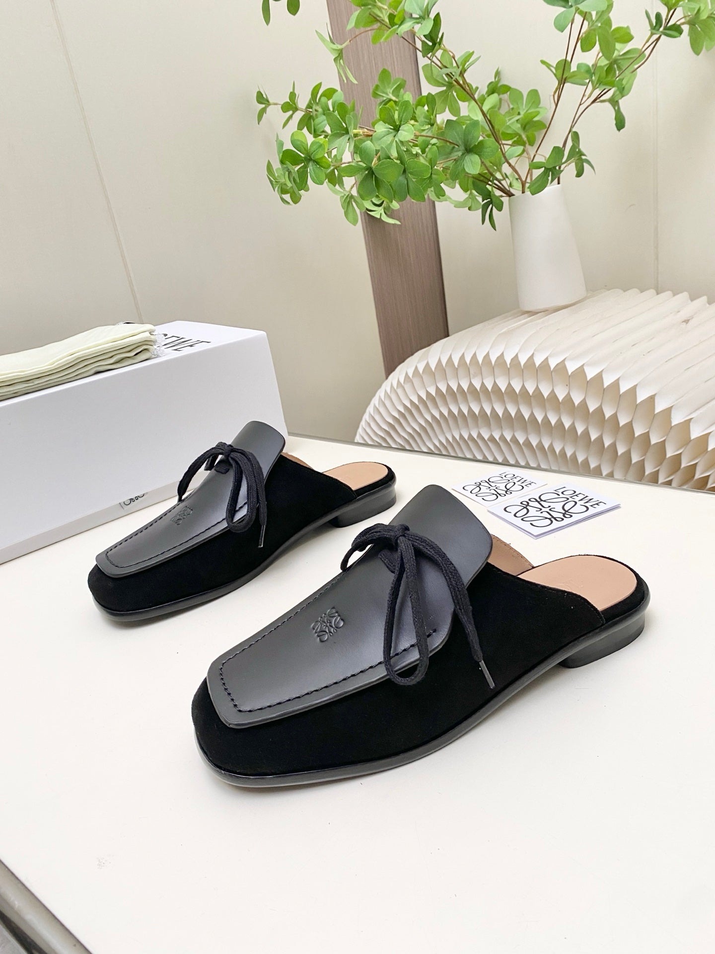 LOEWE 26S FLAT MULES IN BLACK CALFSKIN AND SUEDE
