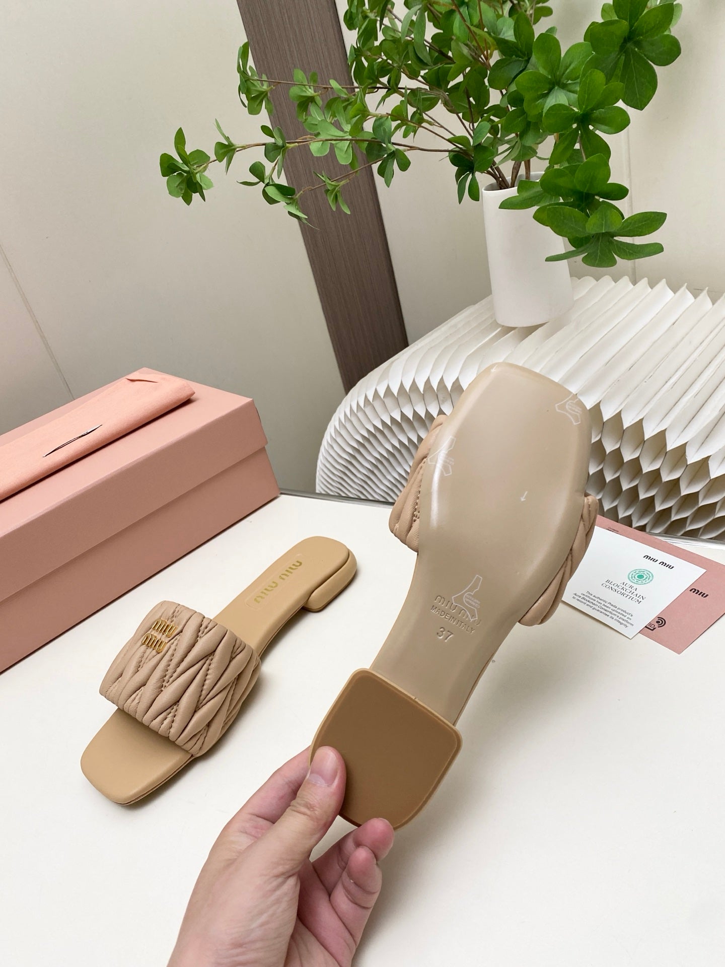 MIUMIU 26S MATELASSE SLIDES IN BEIGE CALFSKIN