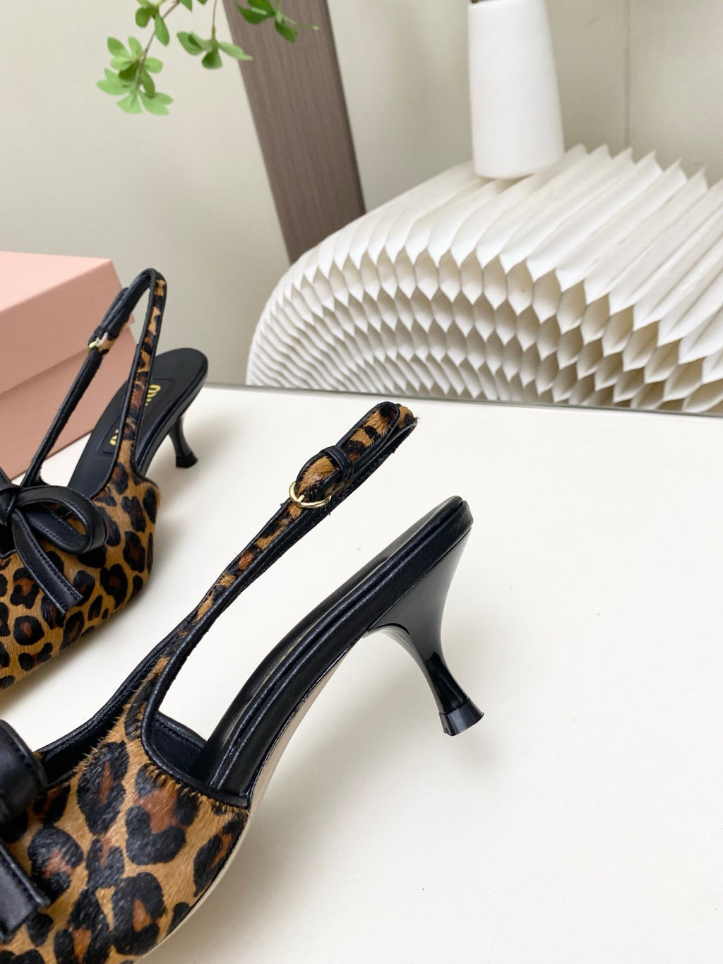 MIUMIU 26S SLINGBACK PUMPS 55MM IN LEOPARD PRINT CALF HAIR WITH BOW