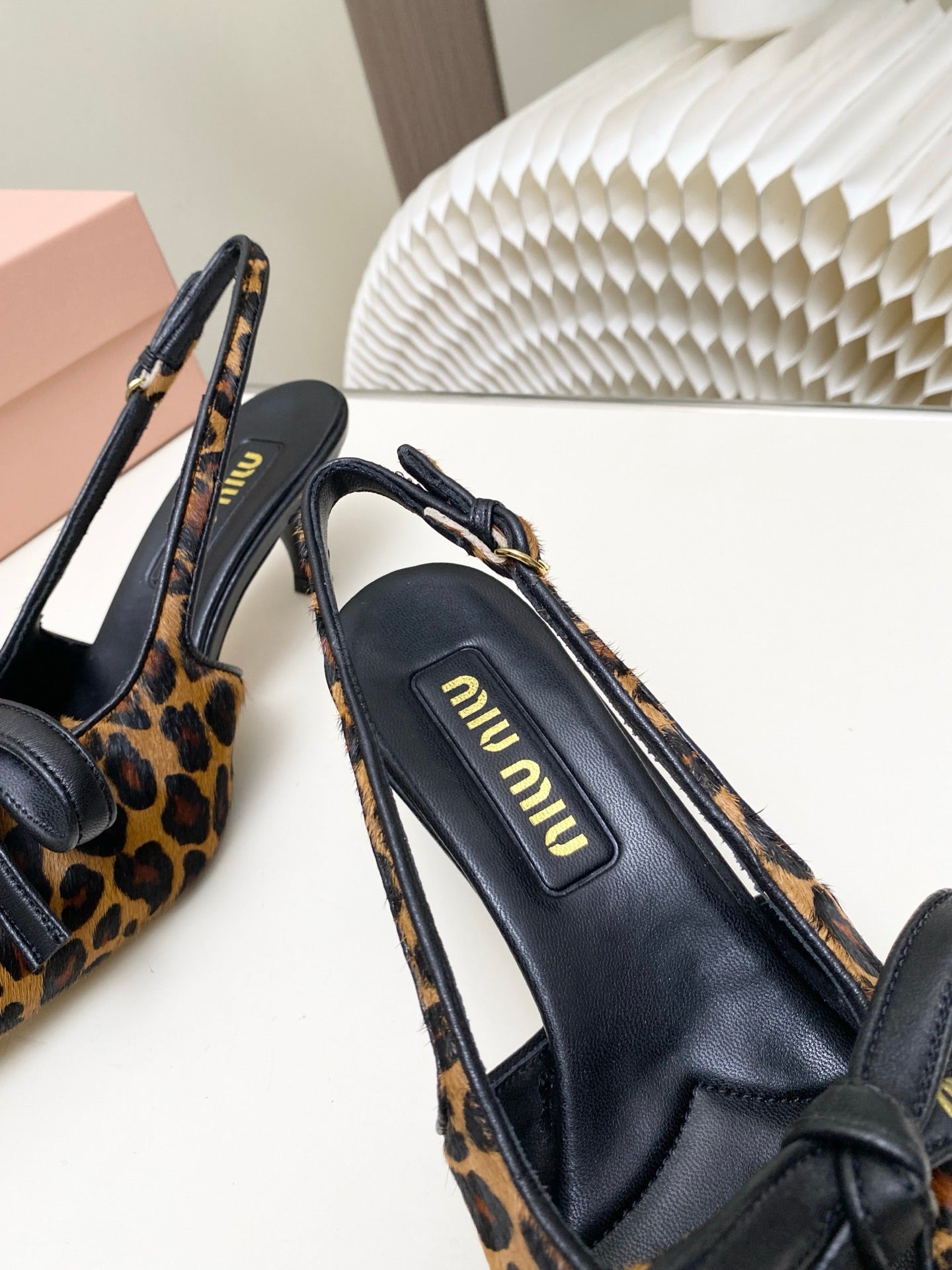 MIUMIU 26S SLINGBACK PUMPS 55MM IN LEOPARD PRINT CALF HAIR WITH BOW