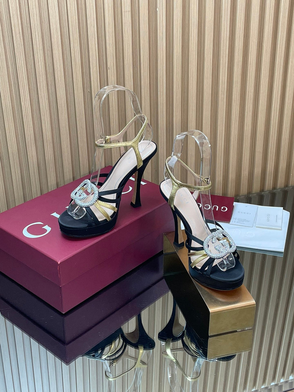 GUCCI 26S HIGH-HEELED SANDALS 125 MM IN BLACK SATIN AND GOLD CALFSKIN